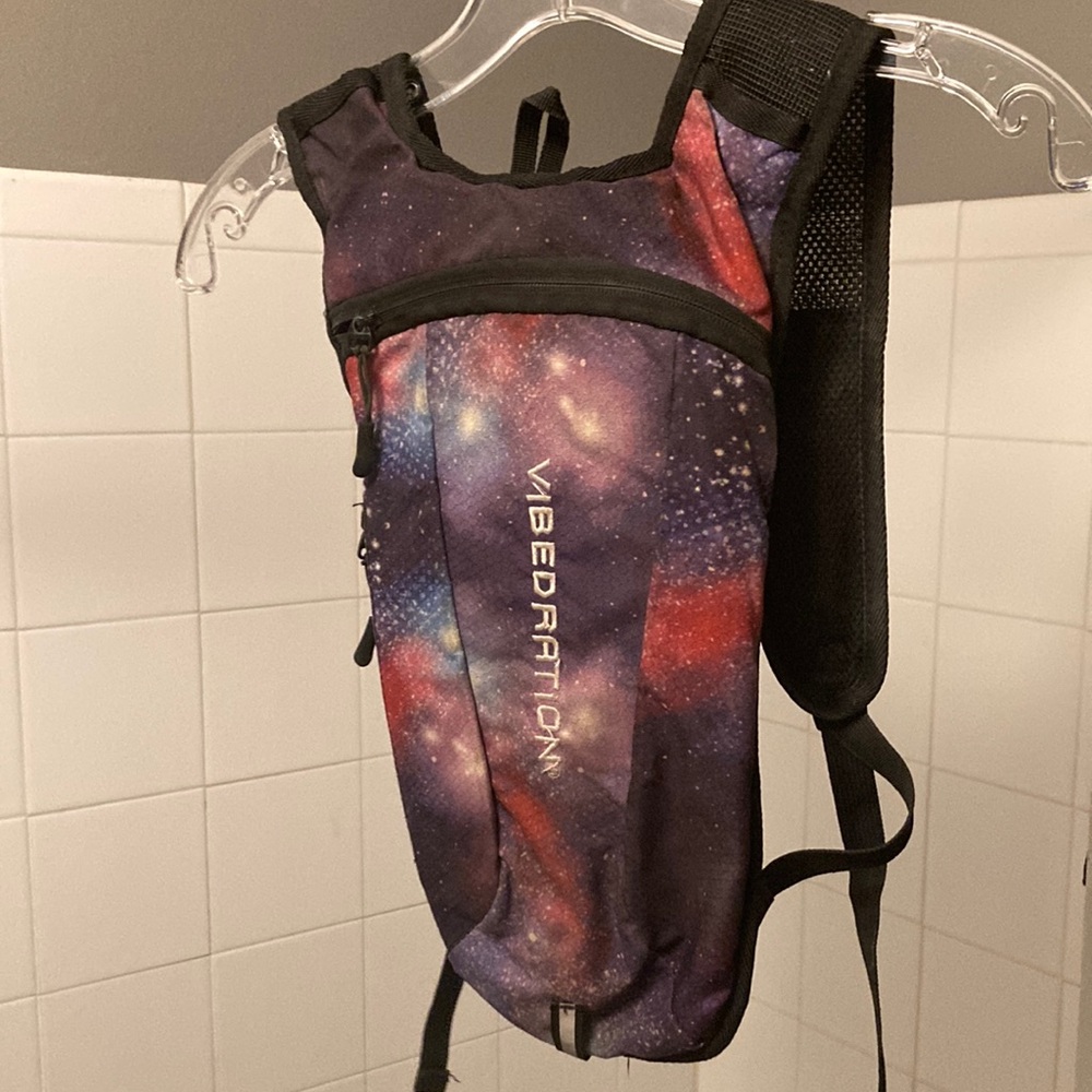 Hydration pack by Vibedration, galaxy print, water bladder not included